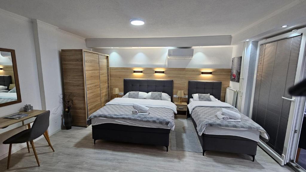 Kreveti u Apartmanu broj 2